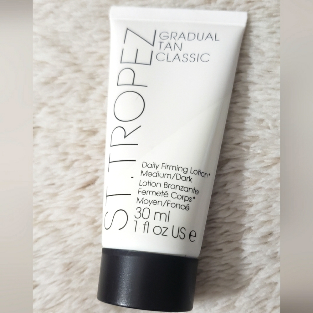 ST. TROPEZ GRADUAL TAN CLASSIC DAILY FIRMING LOTION MEDIUM/DARK.